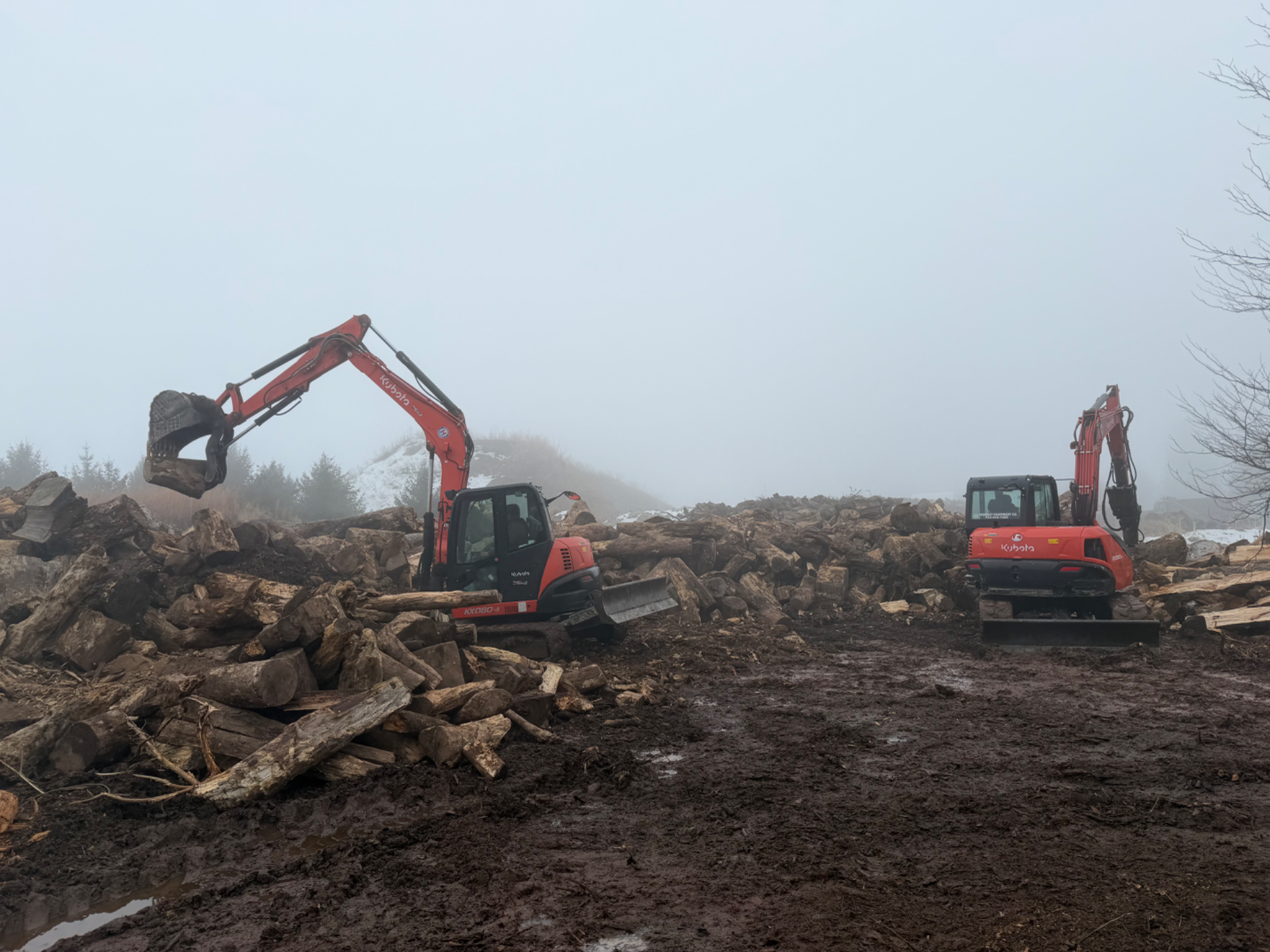 Excavators processing wood waste